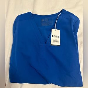 Small Royal blue Casma scrub top. Never worn.